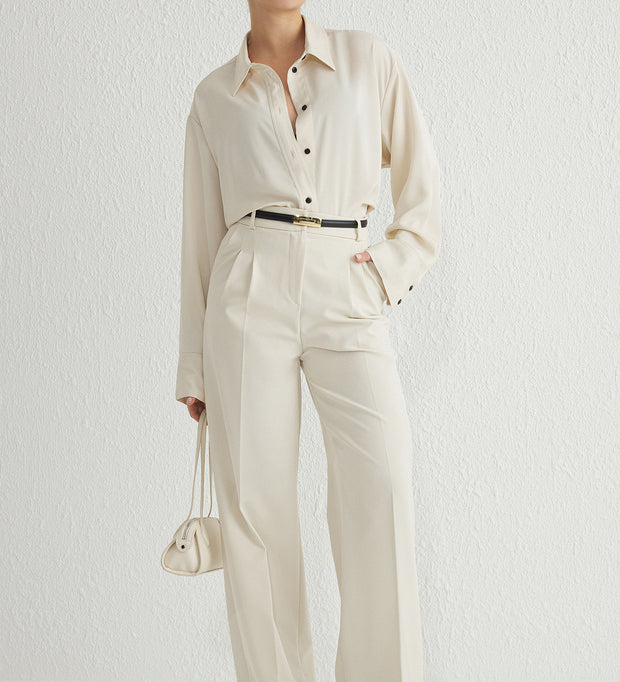 Shop the Atikastyle High-Waisted Beige Wide-Leg Trousers – elegant tailored pants perfect for office wear, smart-casual looks, and everyday chic.

