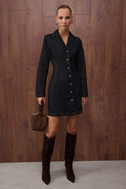 	•	Woman wearing dark denim button-front mini dress – AtikaStyle
	•	Close-up of pearl-style buttons on denim mini dress – AtikaStyle
	•	Dark denim collared long-sleeve mini dress front view – AtikaStyle
