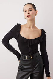 Black rib knit ruffle blouse – front view