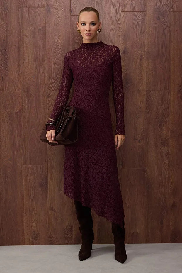 Burgundy lace long-sleeve midi dress with sheer details – AtikaStyle

Elegant fitted burgundy lace dress front view – AtikaStyle

Asymmetrical hemline burgundy lace dress styled for evening – AtikaStyle
