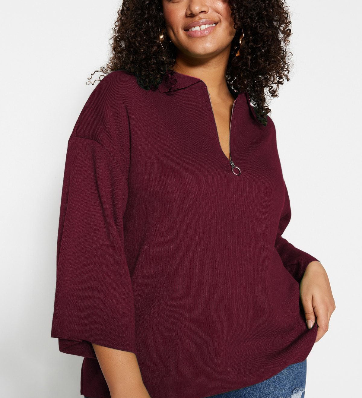 Shop this cozy burgundy half-zip pullover sweater for women. Perfect for casual wear or layering, this relaxed-fit knit top combines comfort and style for every occasion.