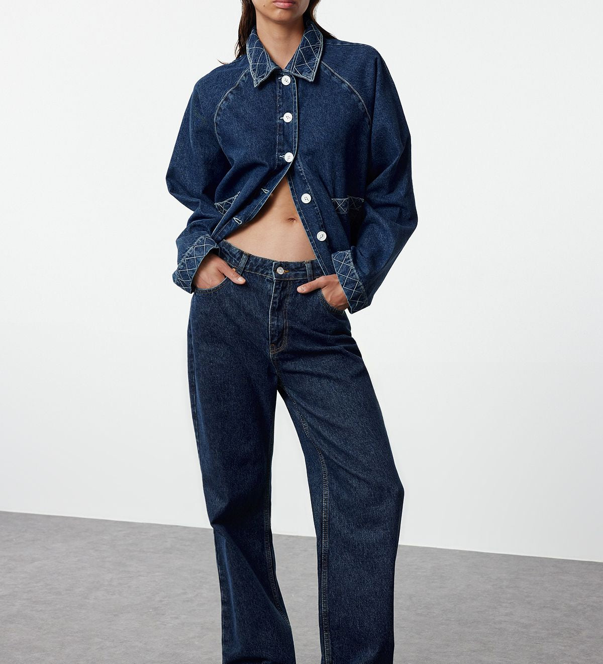 Upgrade your wardrobe with our women’s boxy fit denim jacket. Featuring contrast stitching and a dark wash, perfect for casual or denim-on-denim looks. Shop now!