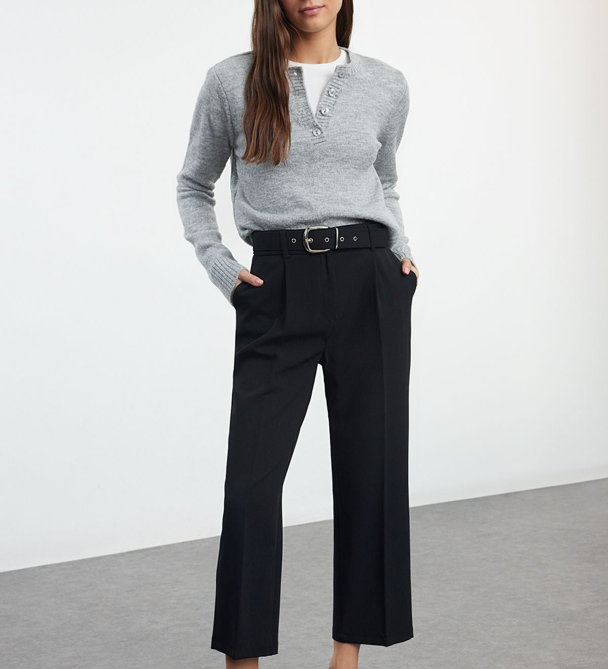 Upgrade your wardrobe with our Women’s High-Waisted Belted Black Trousers. Featuring a tailored fit, chic belt detail, and comfortable fabric, these versatile pants are perfect for both office and casual wear.