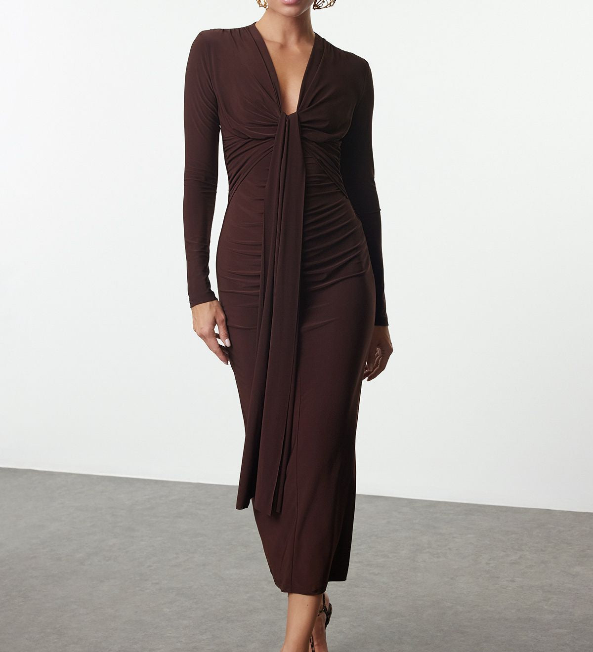 Step into elegance with our women’s long-sleeve draped brown midi dress. Perfect for evening events or special occasions, with a flattering bodycon fit. Shop now!