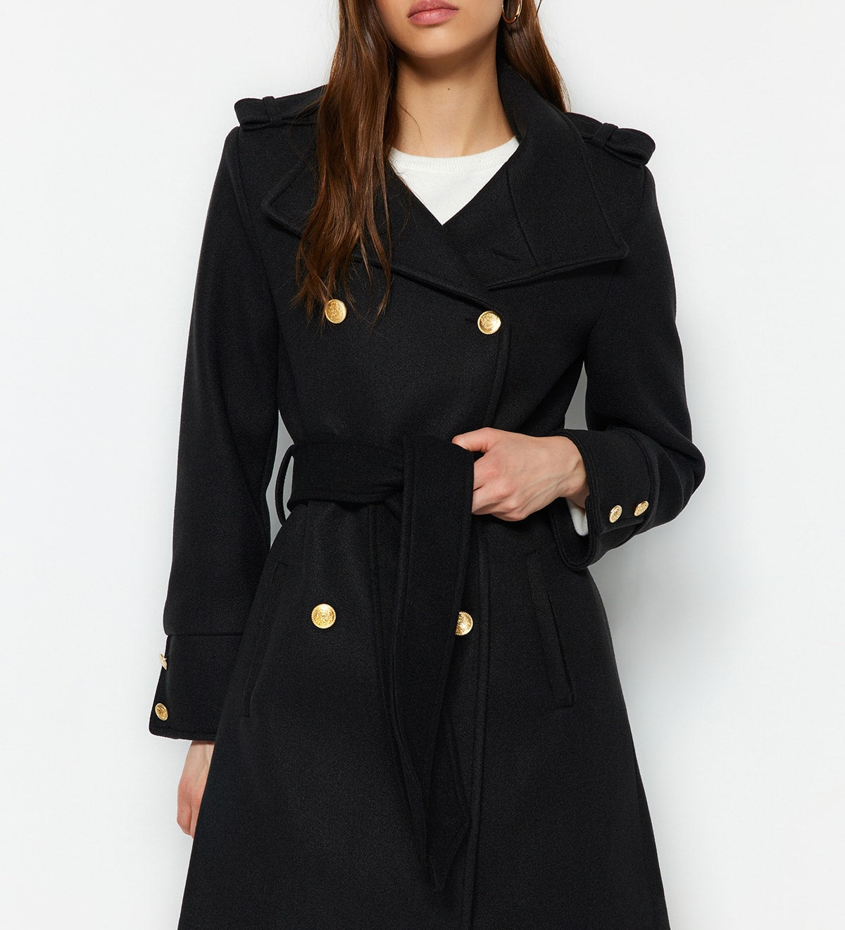Discover timeless style with our Women’s Double-Breasted Black Trench Coat, featuring a belted waist and gold-tone buttons. This elegant, versatile coat is perfect for any occasion, keeping you warm and sophisticated.