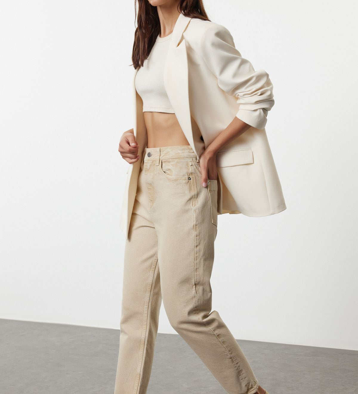 Shop our Women’s High-Waisted Beige Jeans for a perfect blend of comfort and style. Featuring a relaxed fit, tapered ankle, and versatile neutral color, these jeans are a must-have for any wardrobe. Ideal for casual or dressed-up looks, crafted from premium denim. Free shipping on orders 