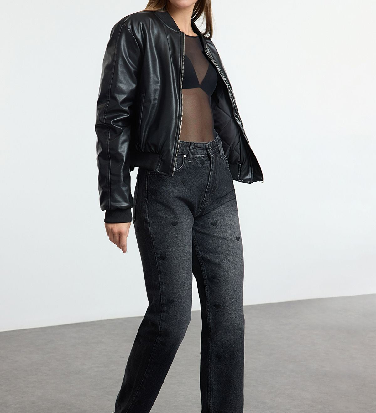 Make a statement with our women’s black high-waisted heart print jeans. Stylish and comfortable straight-leg denim with a subtle romantic touch. Shop now!