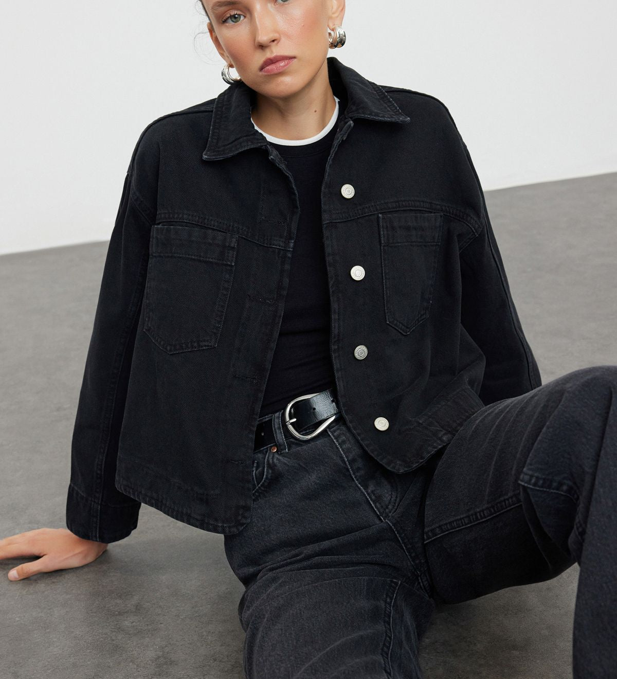 Upgrade your wardrobe with our women’s black denim jacket. Featuring a boxy fit and button-up design, this casual outerwear is perfect for effortless style. Shop now!