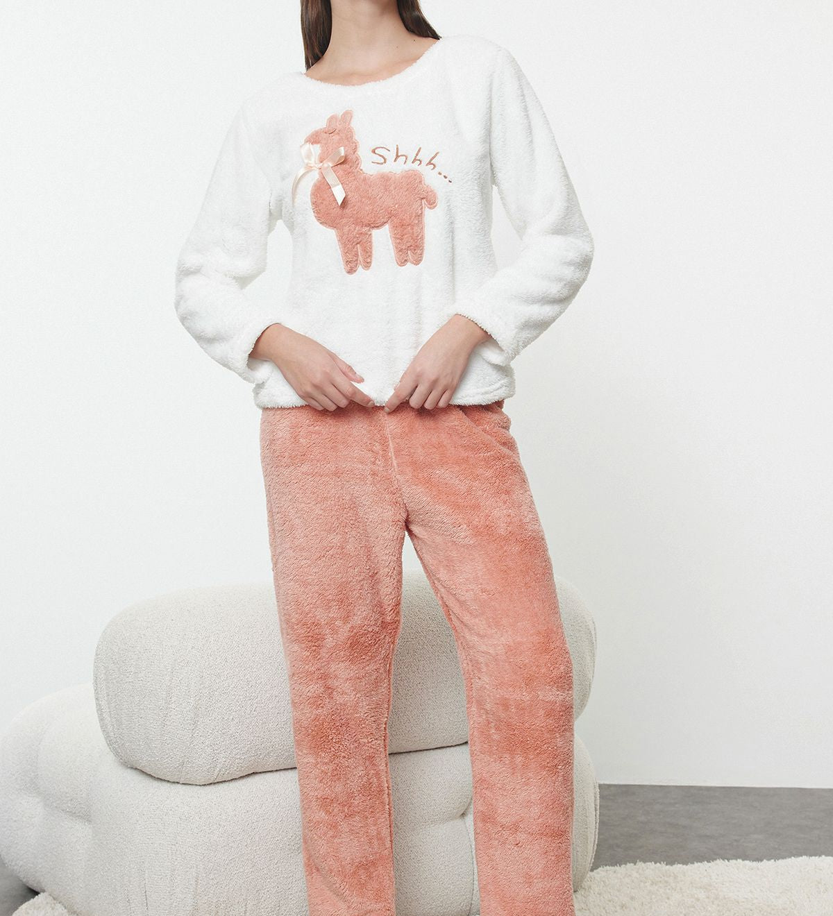        Machine wash cold on a gentle        
        cycle to preserve softness.
	2.	Use mild detergent to maintain  
            color and texture.
	3.	Wash inside out to protect the 
            graphic design.
	4.	Do not bleach or use harsh  
            chemicals.
	5.	Tumble dry low or air dry to prevent shrinking.
	6.	Avoid ironing directly on the fleece material.
	7.	Do not dry clean to maintain fabric quality.