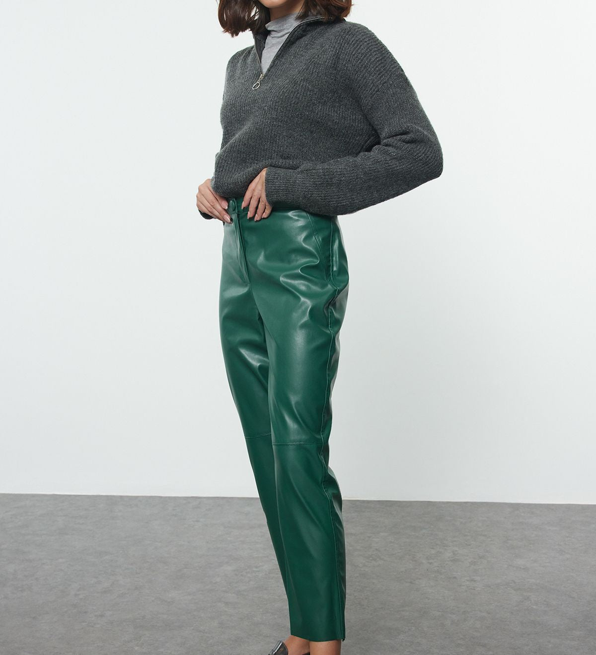 Green faux leather pants, cropped leather pants, vegan leather pants, stylish leather trousers, leather pants women’s fashion, Atika Style leather apparel.
