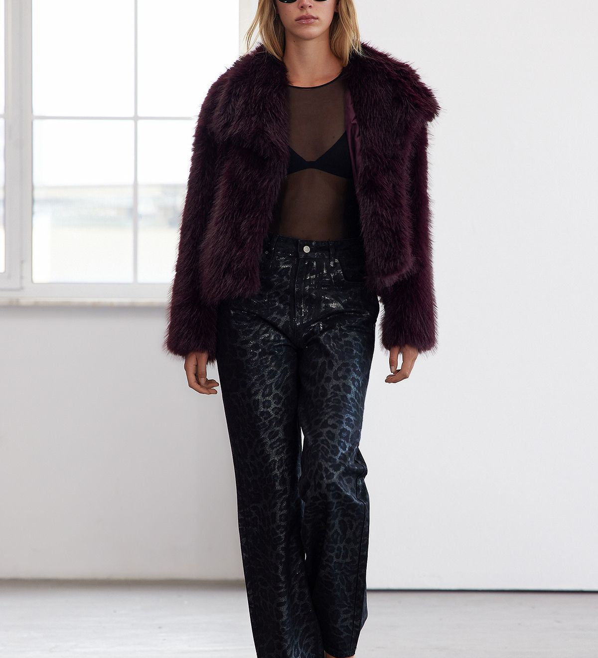 
Shop our luxurious burgundy faux fur coat for women, designed with an oversized fit and rich texture. Perfect for making a bold fashion statement while staying warm and chic this winter.

