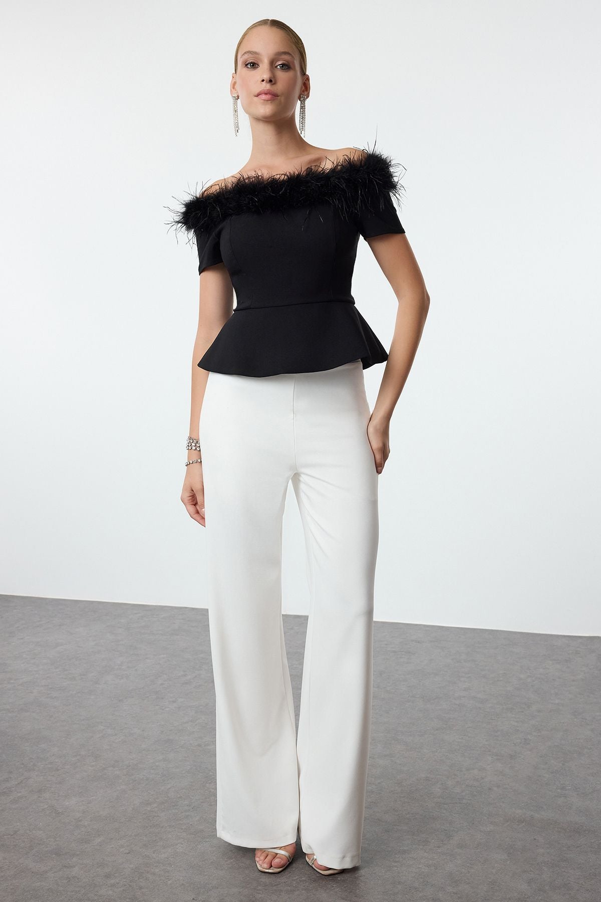 Off-shoulder feather trim top
	•	Black peplum evening top
	•	Elegant formal evening wear
	•	Women’s stylish evening blouse
	•	Off-shoulder black top for parties