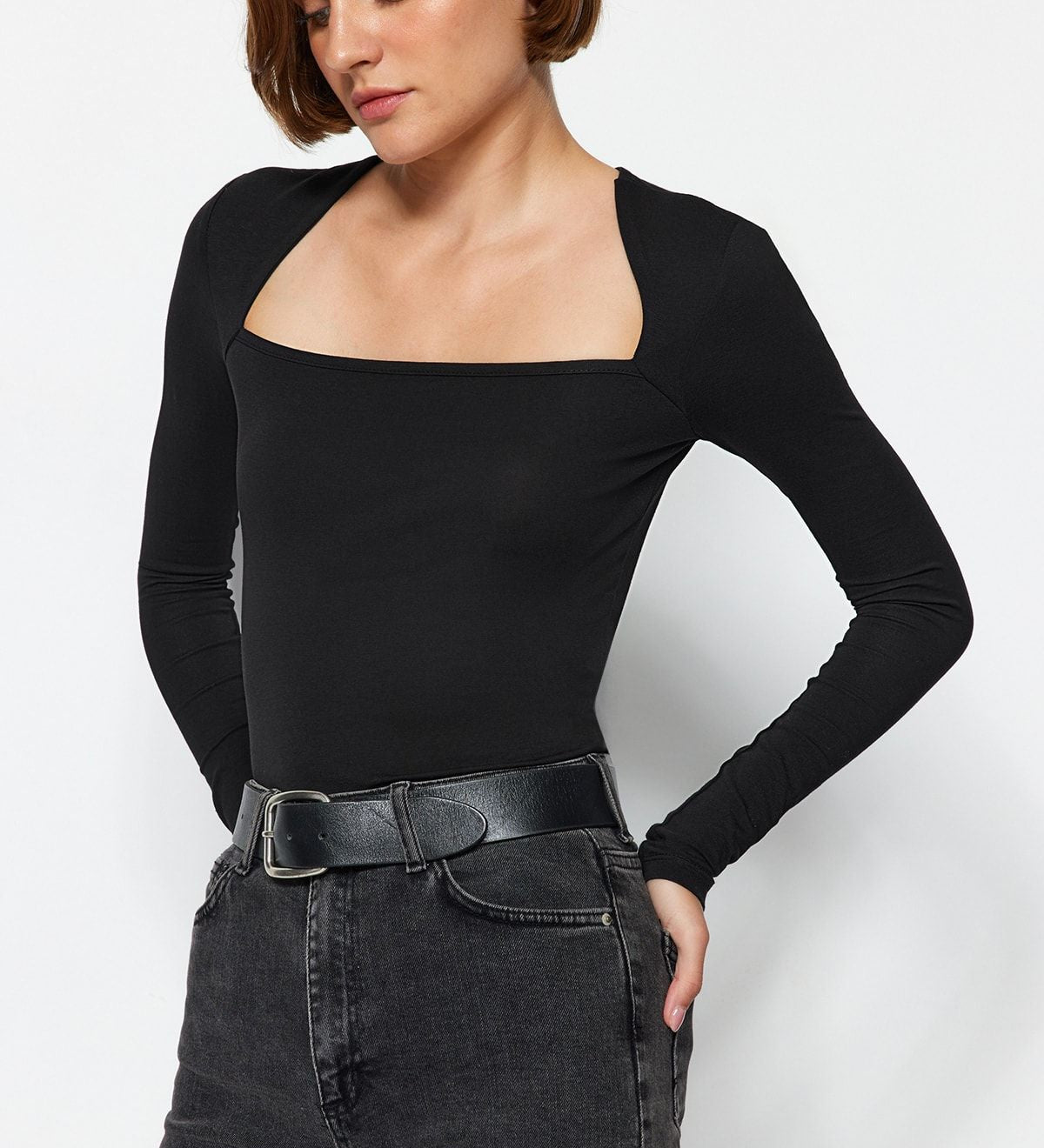 Enhance your wardrobe with our Black Square Neck Long Sleeve Top. This fitted, stylish basic offers a sleek silhouette, perfect for any occasion. Made from soft stretch fabric for ultimate comfort. Shop now for effortless elegance free shipping!
