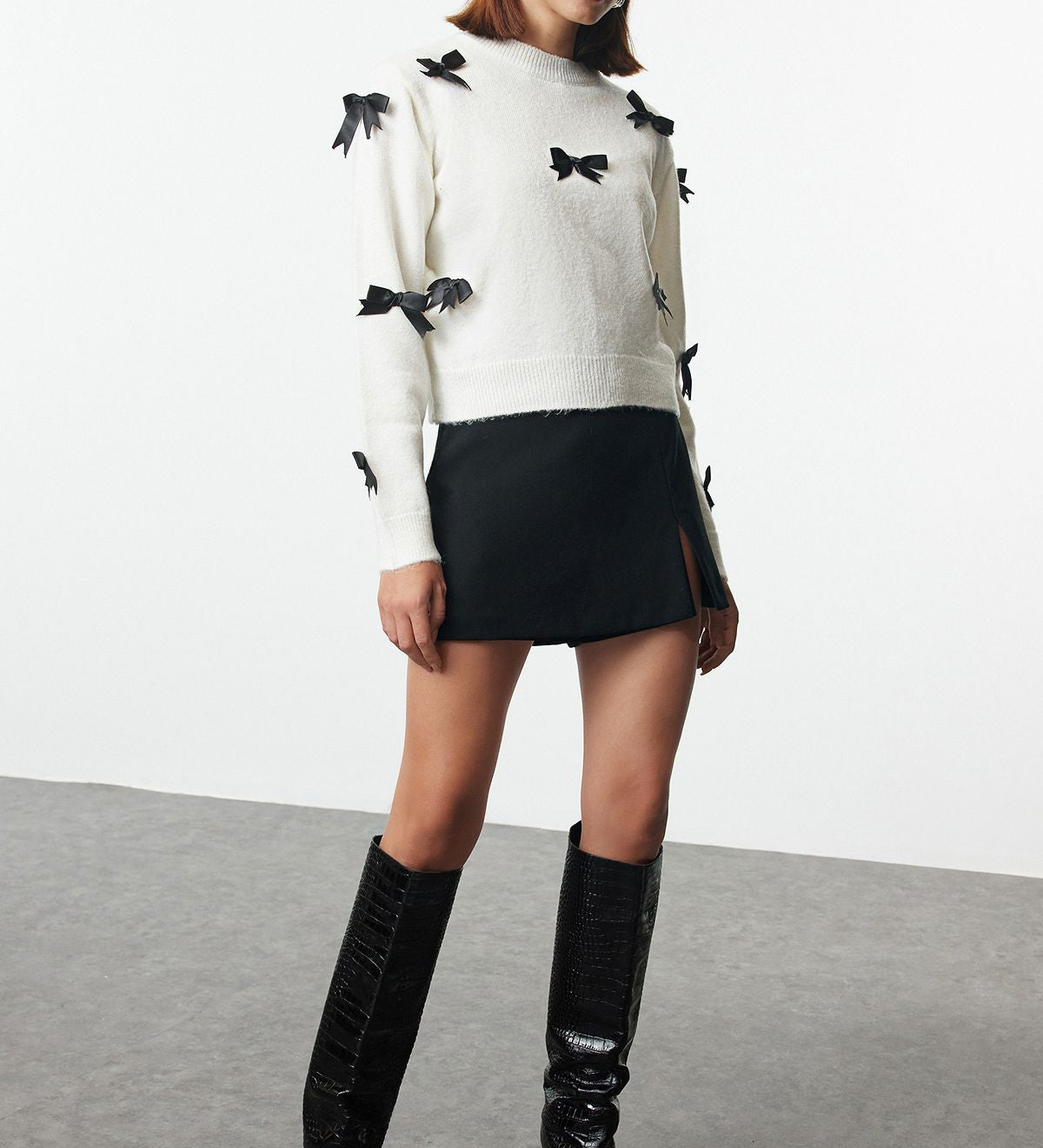 White Sweater with Black Bow Accents - Chic Knitwear