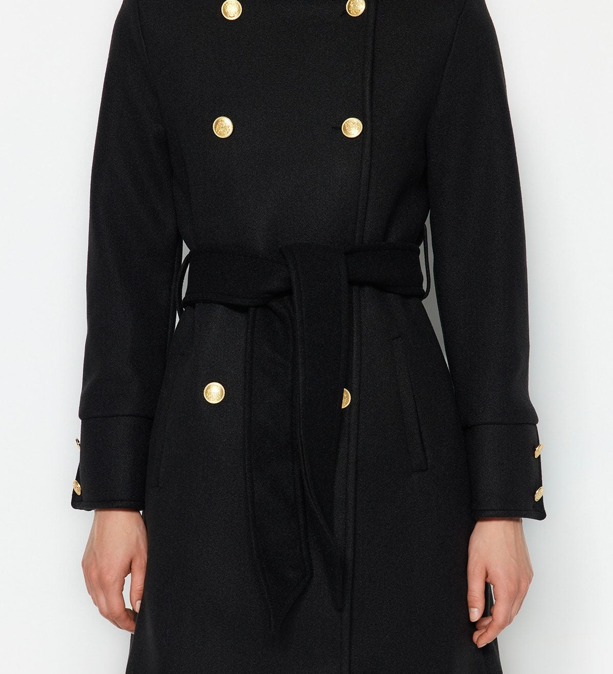 Discover timeless style with our Women’s Double-Breasted Black Trench Coat, featuring a belted waist and gold-tone buttons. This elegant, versatile coat is perfect for any occasion, keeping you warm and sophisticated.