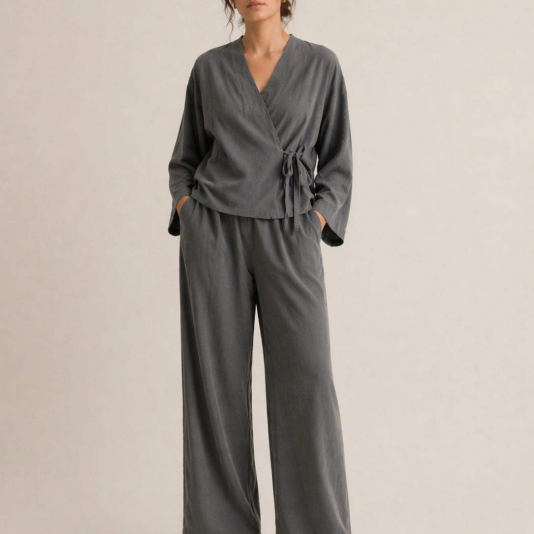     Front view charcoal gray two piece lounge set with wrap top and wide leg pants
