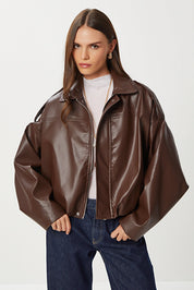 Brown faux leather oversized bomber jacket — front view, zip closed — AtikaStyle