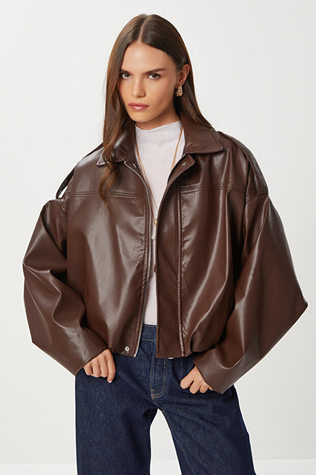 Brown faux leather oversized bomber jacket — front view, zip closed — AtikaStyle