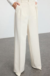 high-waisted beige trousers, women’s wide-leg tailored pants, Atikastyle office wear, elegant beige workwear trousers, chic wide-leg pants women, pleated tailored trousers, business casual beige pants, neutral high-waist trousers
