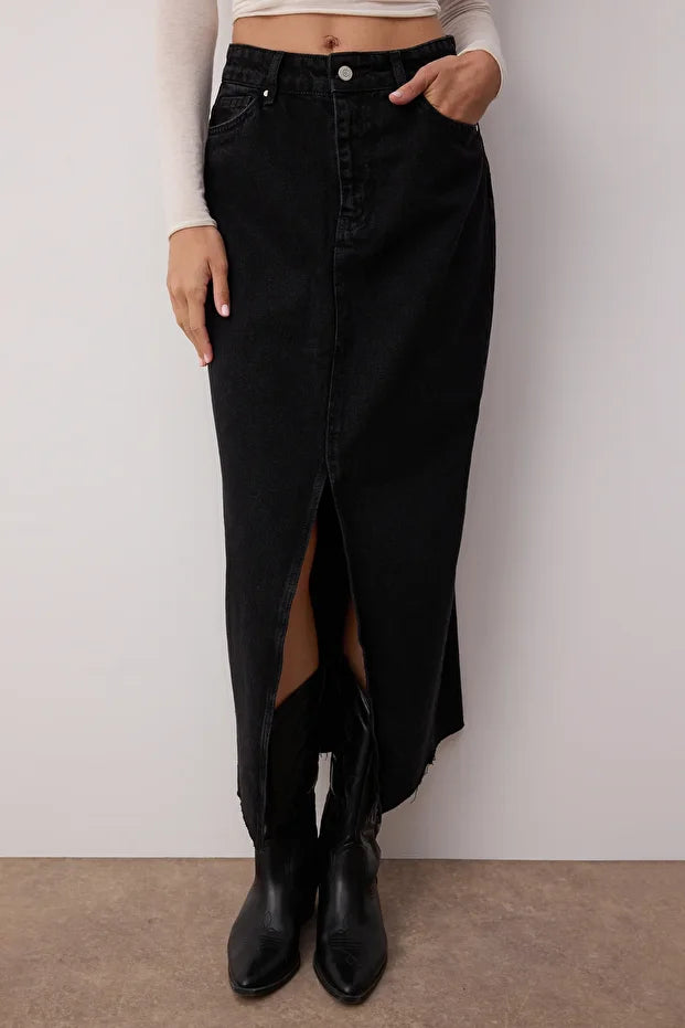 Upgrade your wardrobe with AtikaStyle’s black denim slit maxi skirt. Designed with a flattering high waist and front slit for effortless chic—perfect for casual and street-style looks.