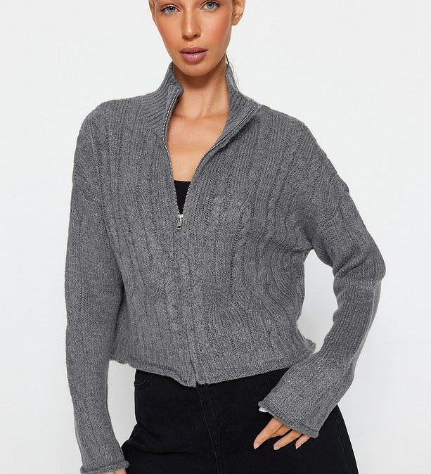 Discover the Atikastyle Women’s Grey Zip-Up Knit Sweater – a cozy ribbed cardigan with a high collar and modern zip closure. Perfect for casual chic looks, fall layering, and everyday comfort. Free shipping available.
