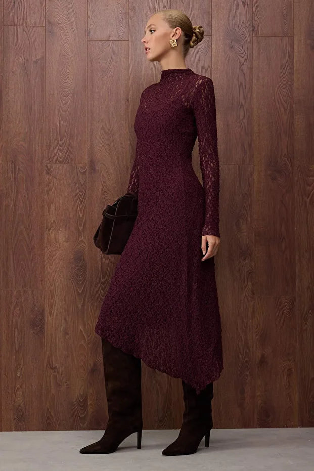 Turn heads in AtikaStyle’s burgundy lace midi dress. Featuring sheer sleeves, a fitted silhouette, and elegant lace detail—perfect for evening wear or special occasions.
