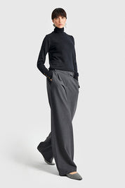 Elevate your wardrobe with these charcoal wide-leg trousers. A high-waist, tailored design that blends polished sophistication with relaxed streetwear edge.
