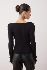 Back view – black fitted long sleeve blouse