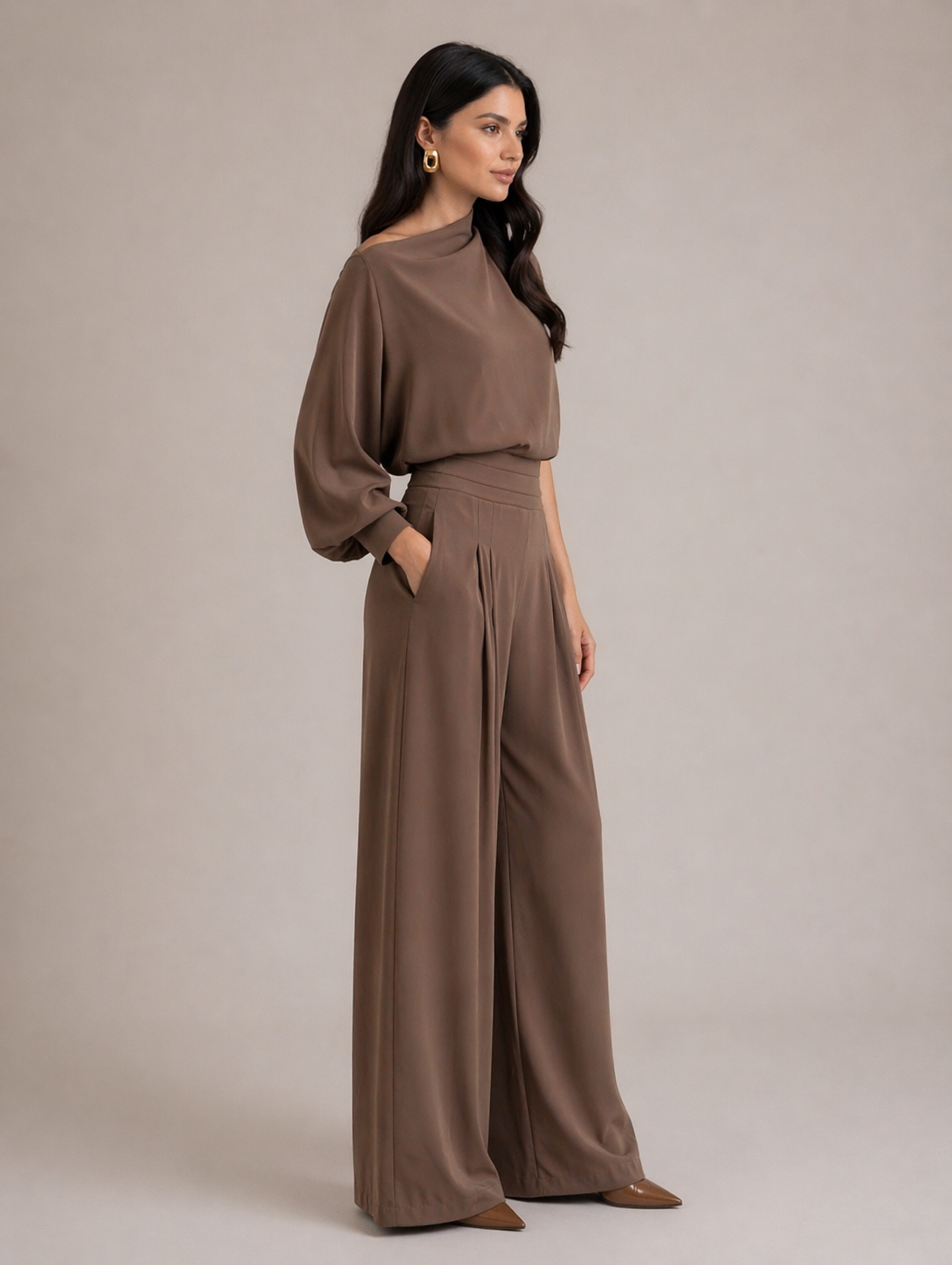 Side view of mocha satin matching set with flowy wide-leg pants and asymmetrical top