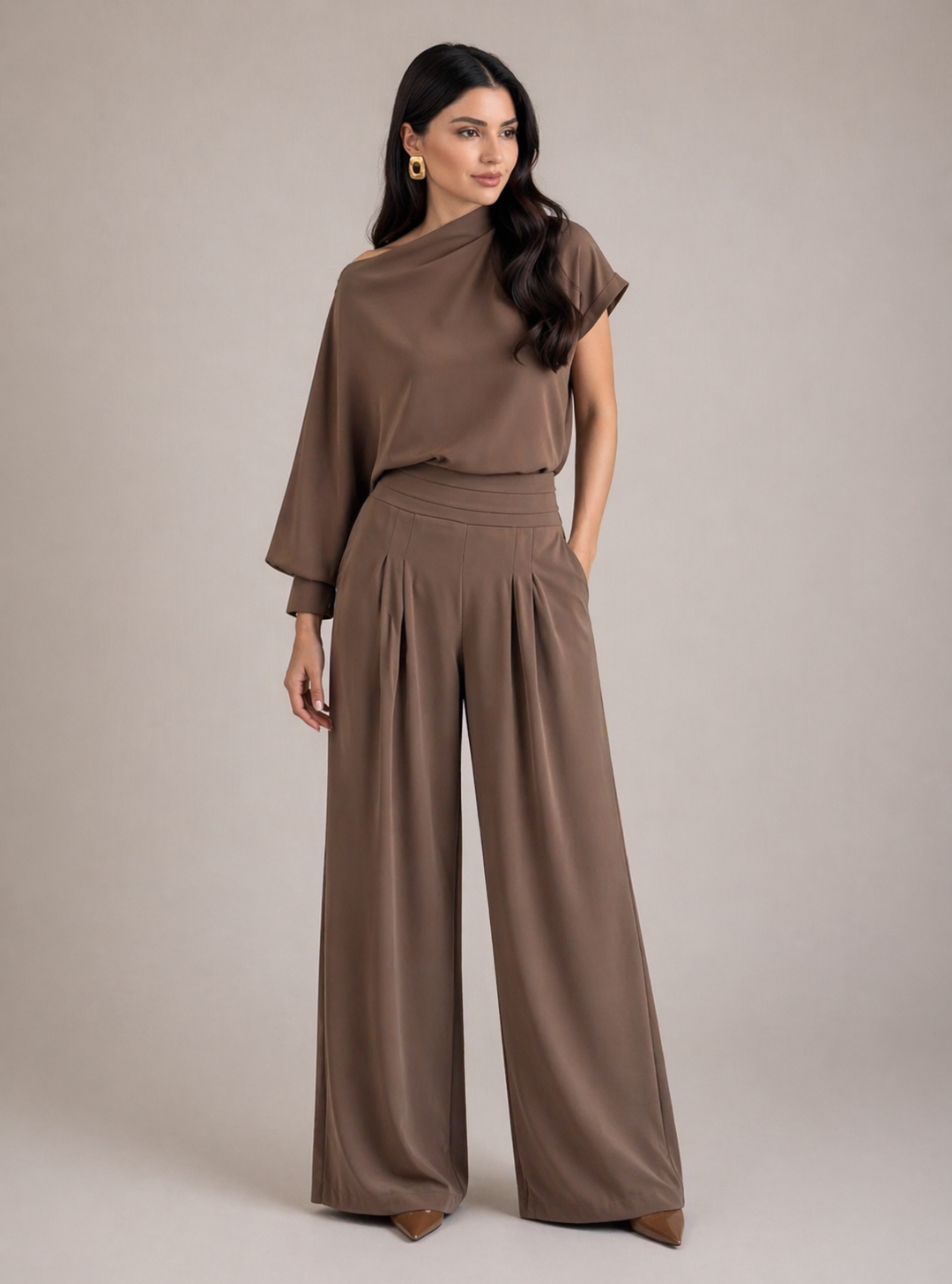 Woman wearing mocha satin two piece set with draped top and wide-leg pants chic evening outfit
