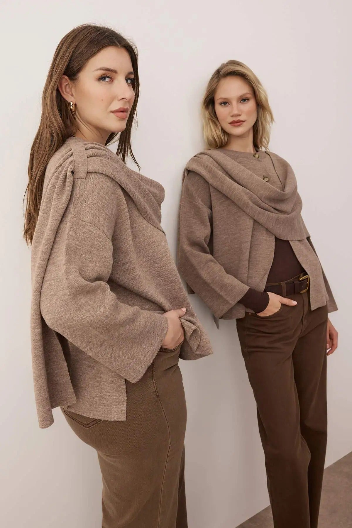 Woman wearing a mocha layered drape knit sweater with asymmetrical front, cozy soft fabric – AtikaStyle.”