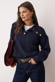 Navy chunky knit sweater with gold shoulder buttons on model – AtikaStyle”
