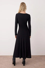 Black Ruffle Boat Neck Maxi Knit Dress | Flared Hem & Waist Tie | AtikaStyle