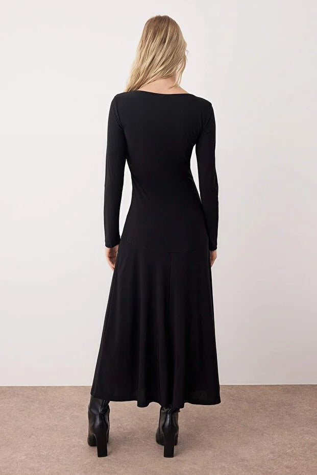 Black Ruffle Boat Neck Maxi Knit Dress | Flared Hem & Waist Tie | AtikaStyle