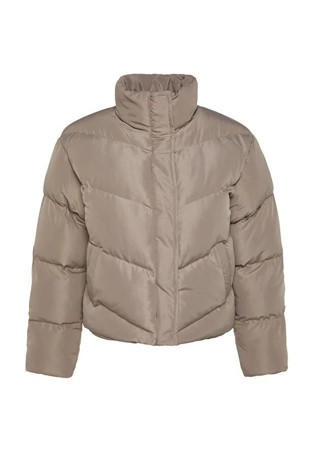 Beige puffer jacket on a white background