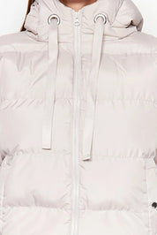 Close-up of a light pink hooded jacket with a zipper on a white background