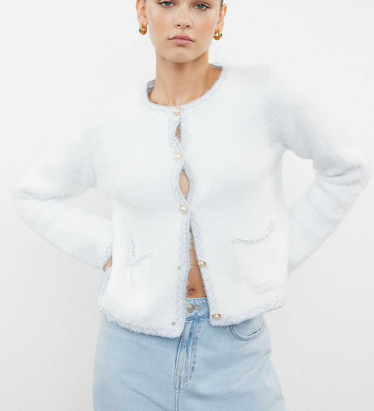 Luxury Pearl Button Fluffy White Cardigan – Soft Knit Sweater for Women

Discover our soft fluffy white cardigan with pearl buttons – a stylish knit sweater for women, perfect for layering. Shop now for cozy elegance this season!
