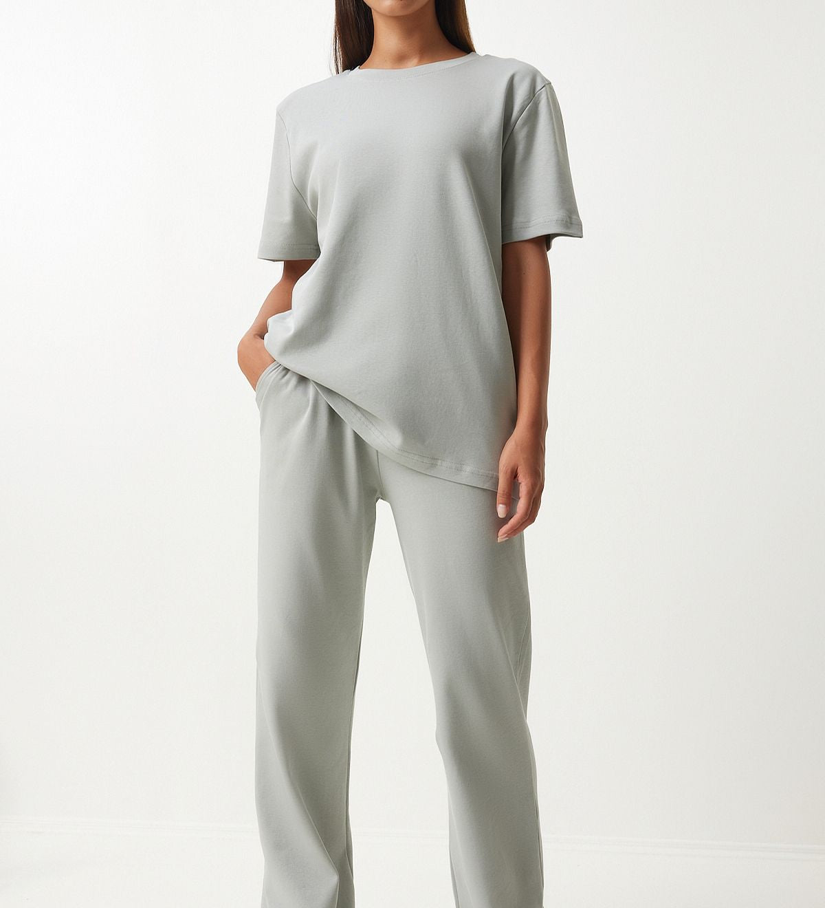  Experience the ultimate in comfort and style with our Minimalist Gray Loungewear Set. Featuring a relaxed-fit T-shirt and wide-leg pants, this sleek and versatile set is perfect for lounging or casual outings. Shop now for stylish and comfortable loungewear!
