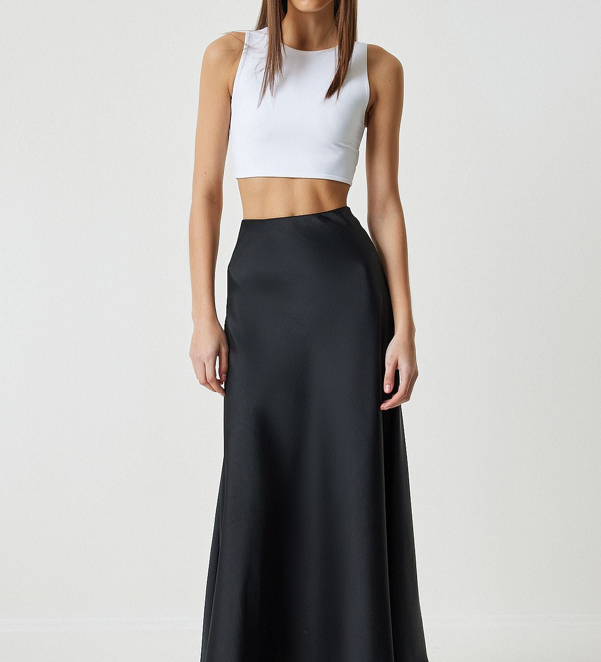 black satin maxi skirt, elegant long skirt, women’s A-line skirt, formal black skirt, versatile satin skirt, luxury satin skirt, flattering A-line skirt, comfortable long skirt, chic black skirt