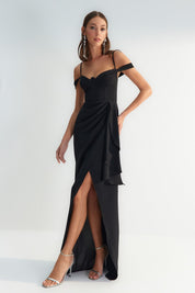 Shop our elegant black off-the-shoulder evening gown, perfect for formal events. Features a sweetheart neckline, draped waist detail, and high slit. Available now a atikastyle.com.”
