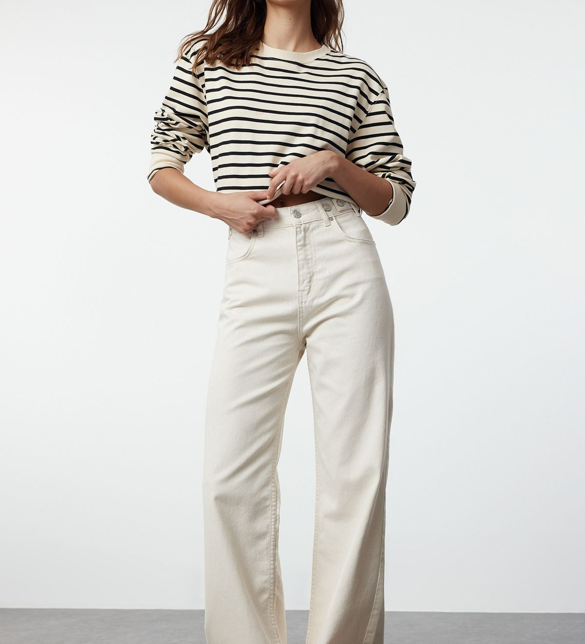 Elevate your style with our High-Waisted Cream Wide-Leg Jeans. Perfect for casual and semi-formal occasions, these trendy jeans offer a flattering fit and sophisticated look. Shop now for high-quality women’s denim, enjoy free shipping!